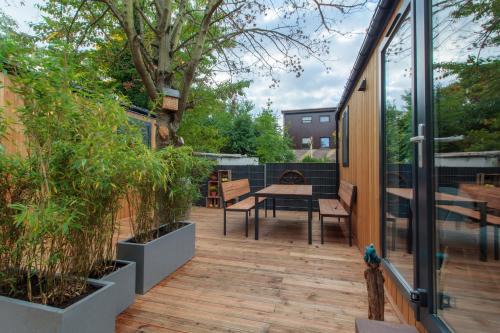 Queichheim House | Iguana - Das Tiny Haus am Reptilienzoo Reptilium