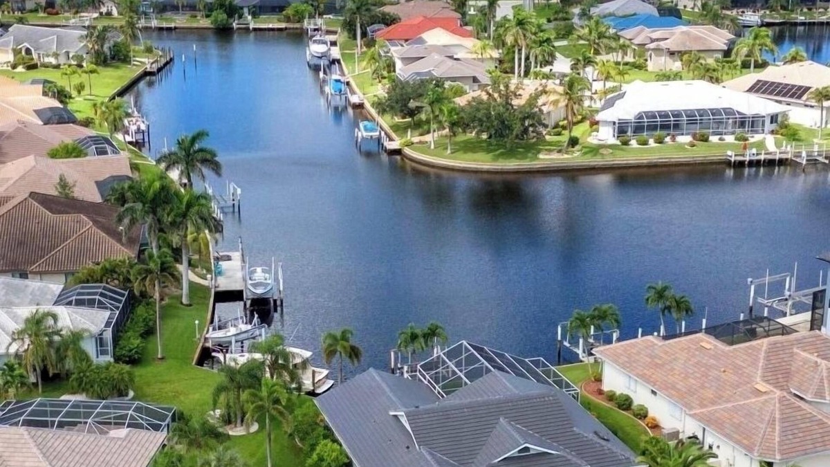 Burnt Store Isles House | INCREDIBLE WATER VIEW! NEW LUXURY REMODELED HOME; HEATED SALT POOL, GOLF NEARBY