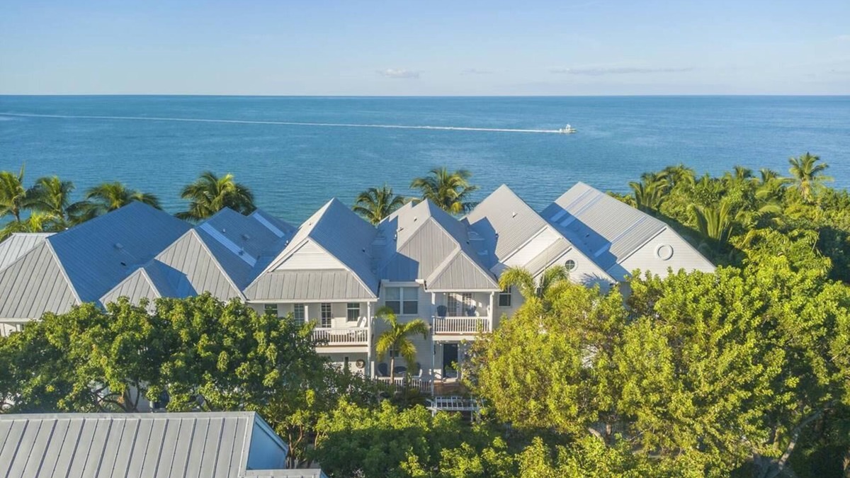 Indigo Reef Marina Homes House | Indigo Reef Resort Premium Waterfront Villa 64 With Boat Dockage, Pool, and Sunset-View