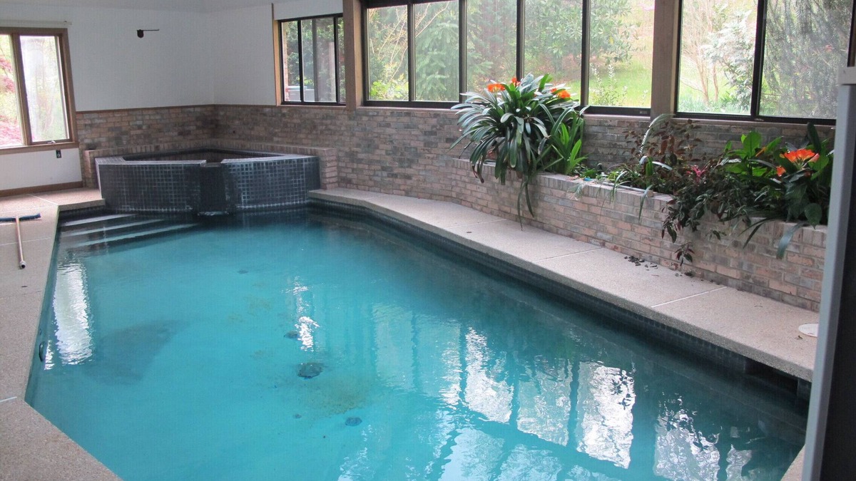 Chesapeake Beach House | Indoor pool and spa in contemporary French home secluded in surrounding woods