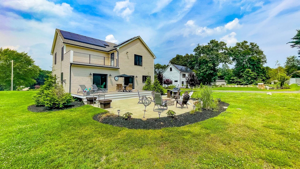 Salisbury House | Inviting house in Salisbury with EV charger, balcony, firepit, and gas grill