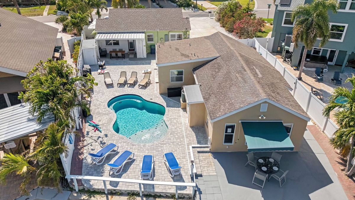 Indian Rocks Beach House | IRB Oasis: 2 homes, Heated Salt Pool, Waterfront, Sleeps 14
