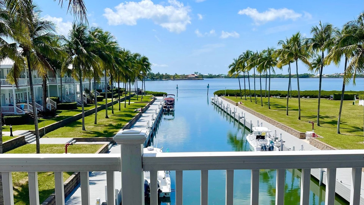 Indigo Reef Marina Homes Villa | Isla Marlin 28: Palm lined luxury villa w/dockage and sunset views