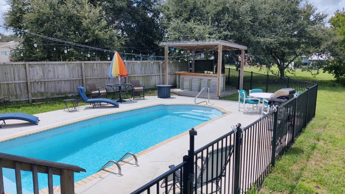 Butler Beach House | Island Escape - Water Views, Private Pool, Boat Dock, Walk to Beach