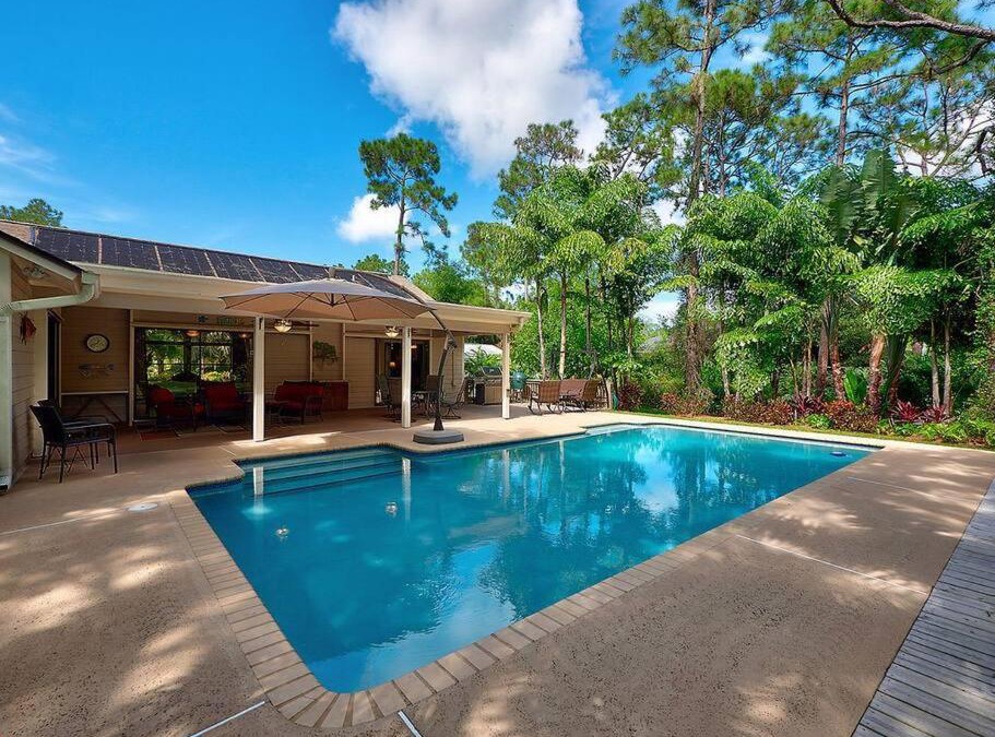 Jupiter House | Jupiter Farms Tropical Oasis with Lush Landscaping