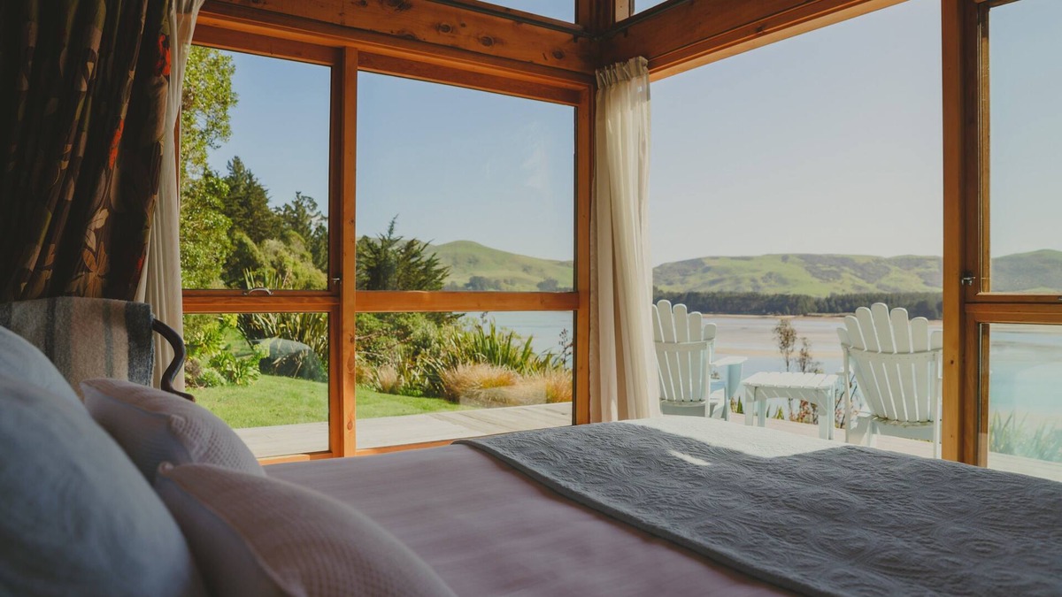 Cape Saunders Resort | Kahu Studio Wake up with a stunning view from the Papanui Inlet