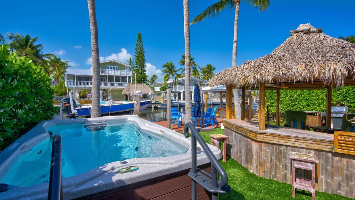 Twin Lakes House | Key Largo Canalfront Home w/Boat Lift, Swim Spa, Tiki Hut & Game Room