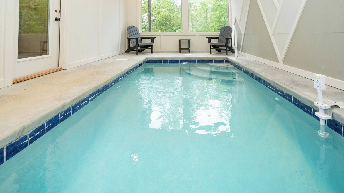 Sevierville Cabin | Kilimanjaro: Indoor Pool! Hot Tub, Wifi, Game Room, Modern, Wooded Views!