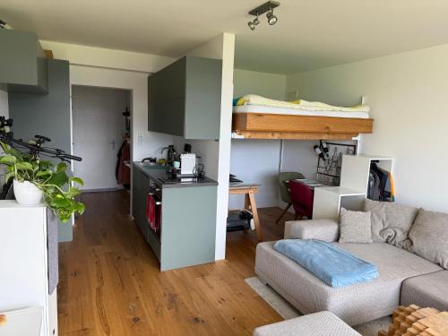 Strobl Apartment | Kuscheln im Hochbett mit Seeblick