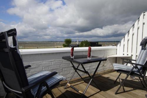 Lembruch House | Lüttke Juwel, Ferienwohnung mit traumhaftem Seeblick