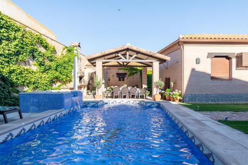 Pulgar House | La Casa de las Flores Casa Rural