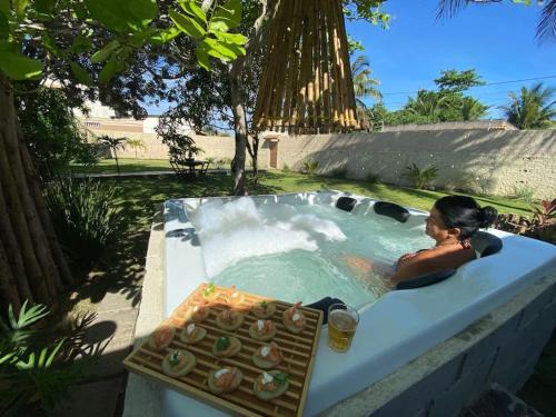 Arraial do Cabo House | La Famille - Casa com Piscina, Jacuzzi, Jardim e próximo a Praia