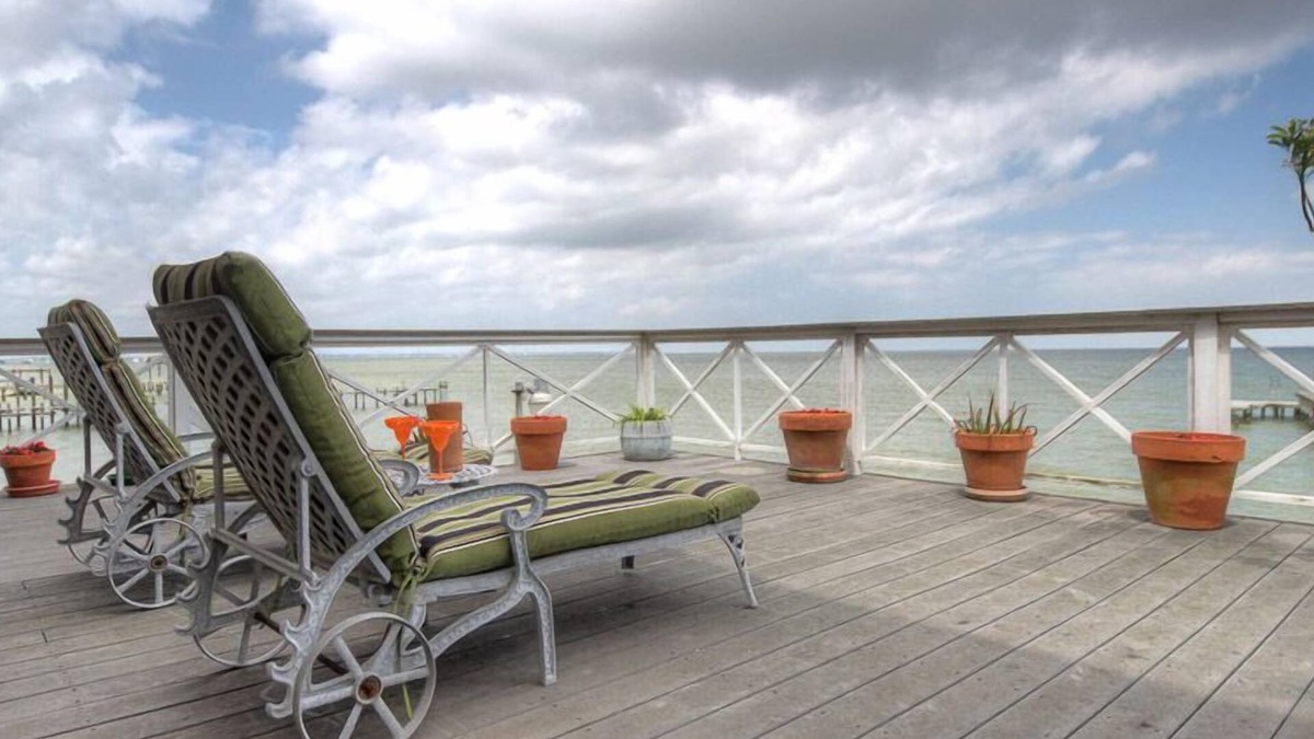 Bacliff Cottage | La Petit Maison, is a waterfront two-story cottage near Kemah,TX