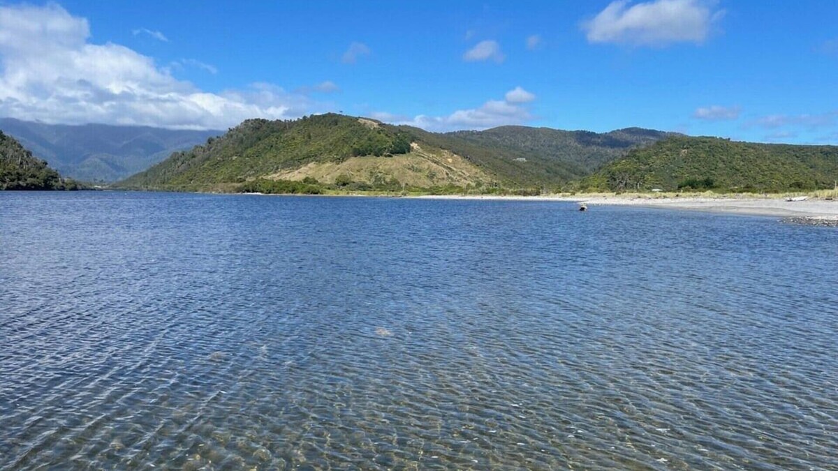 Mokihinui House | Laid back retreat, footsteps to the sand and river mouth, with stunning scenery.