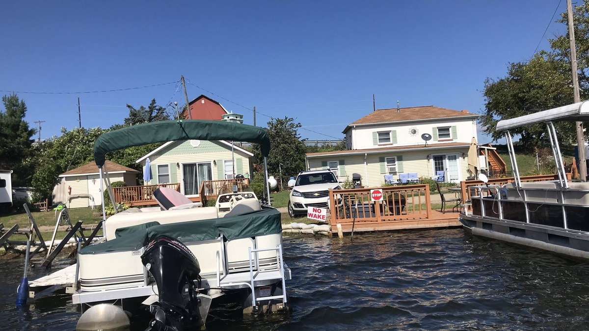 Delton Apartment | Lake Front 1 bedroom upstairs apartment above 2 bedroom cottage.