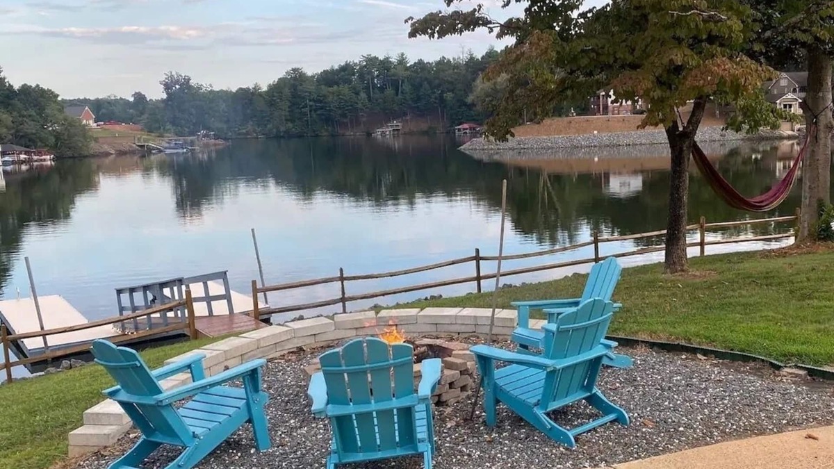 Hickory Cottage | Lake front home 25 ft from water w/private dock, firepits, kayaks & paddle boat