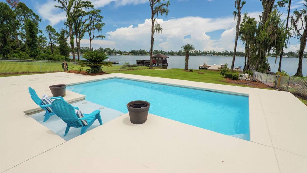 Lake Park House | Lake House Pool Home With Dock and Boat Ramp