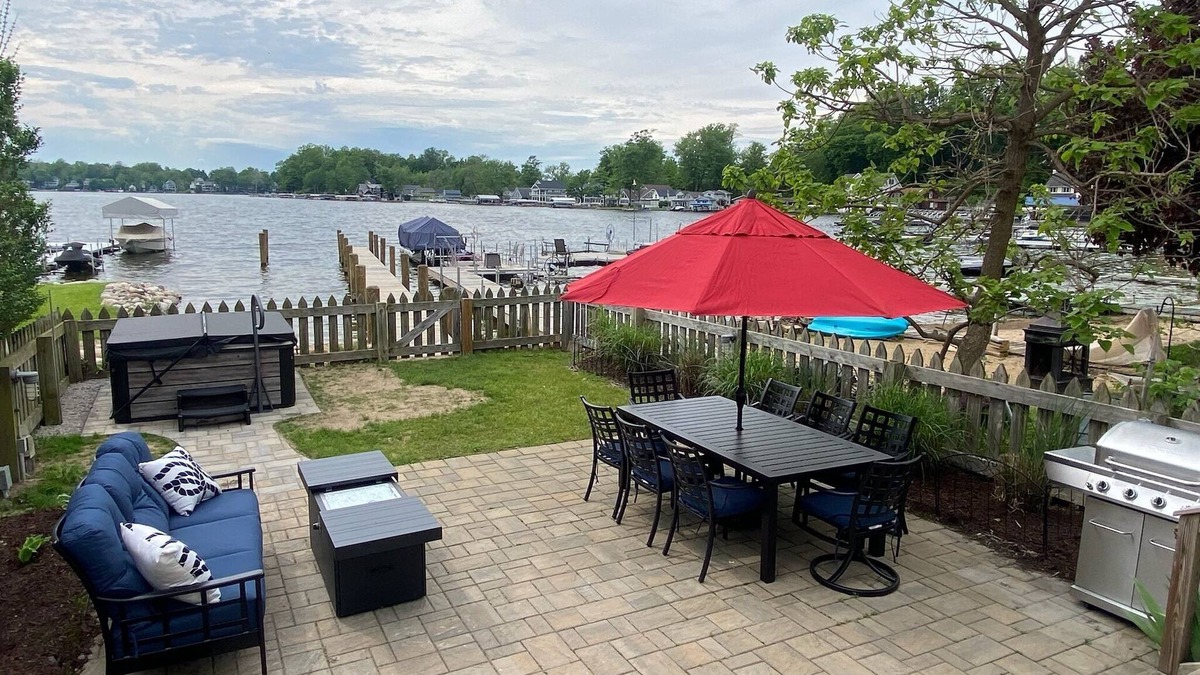 Paw Paw Lake House | Lake Life Awaits with Boat Pier, Beach, Hot Tub, Parking on Paw Paw Lake