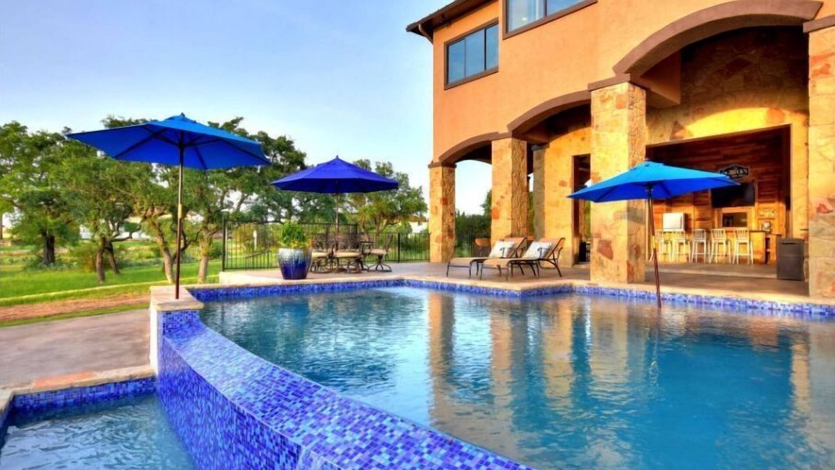 Highland Lake Estates House | Lake Travis DeepWaterfront Home: Views, Pool, Dock, Outdoor Kitchen, OpenAir Bar