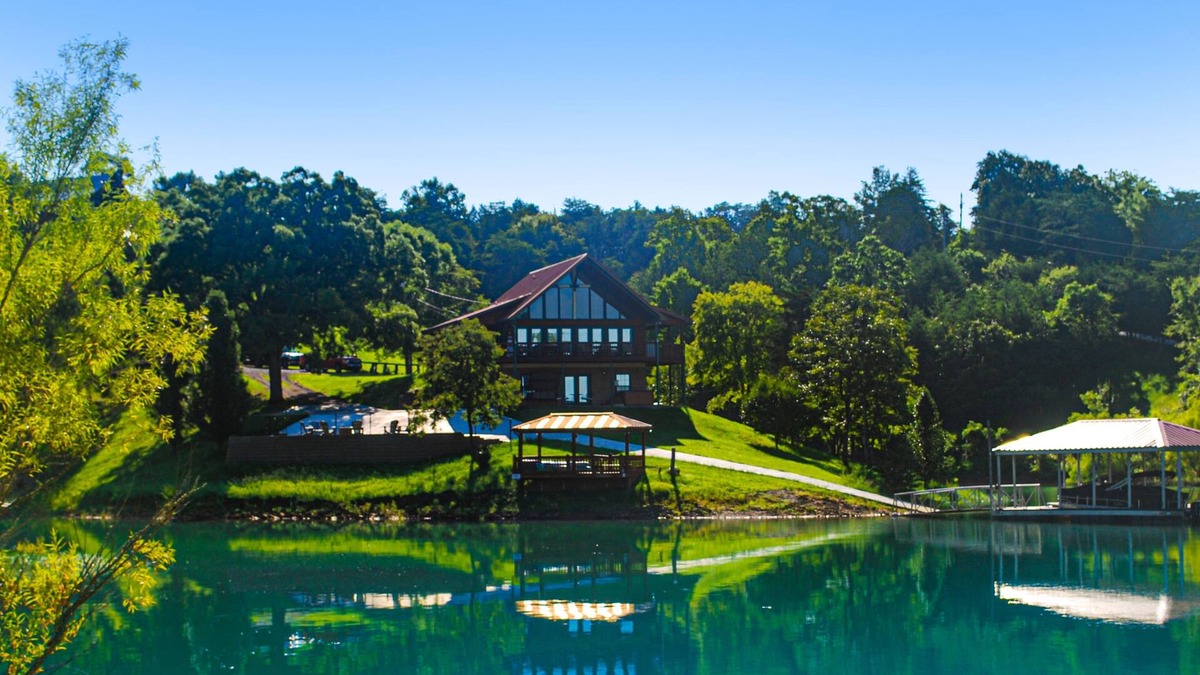 Sevierville Cabin | Lakefront cabin with views, boat ramp, dock, hot tub, & free attraction tickets