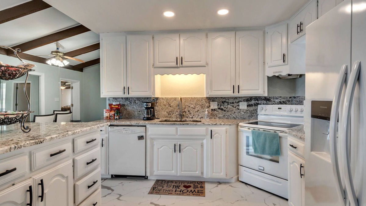 Lakeside City House | Lakefront Guesthouse. Near Sheppard Air Force Base & MSU. Gated, game room & fun