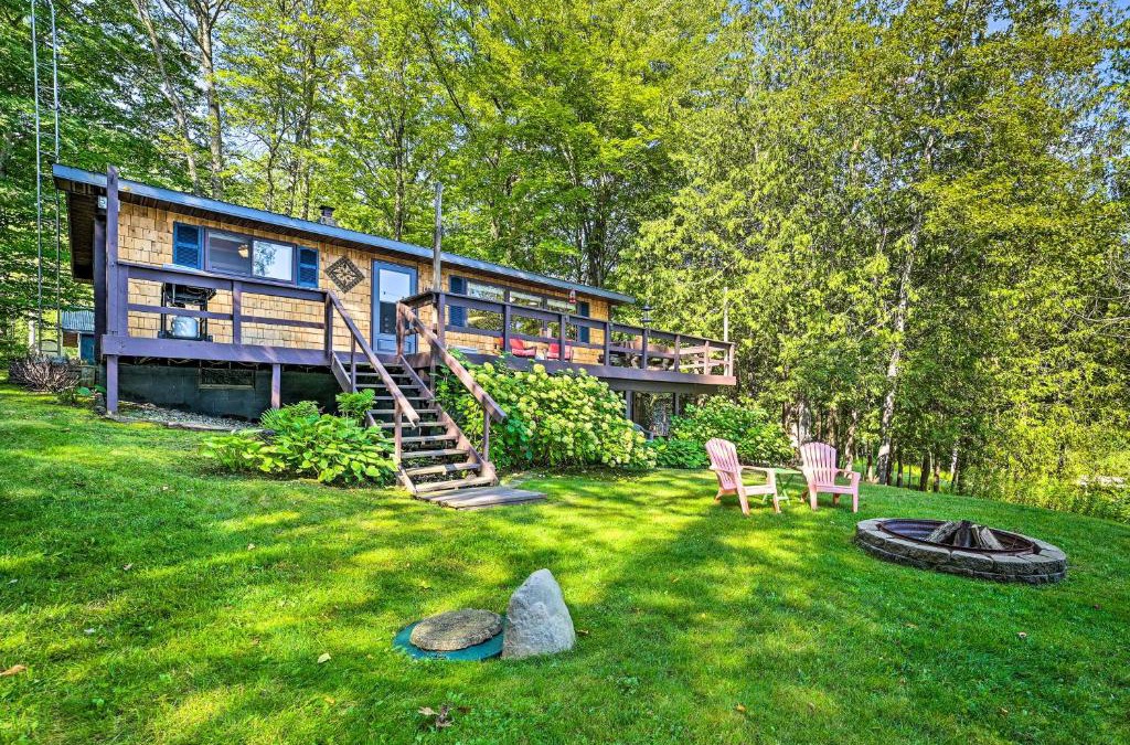 Curtis Township House | Lakefront Hideaway with Dock, Kayaks, Fire Pit!