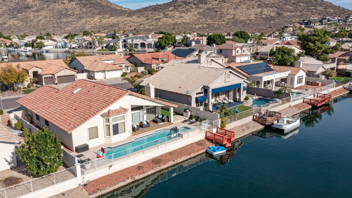Arrowhead Lakes House | Lakefront Home complete with Mountain Views, Pool, Putting Green & Paddle Boat!