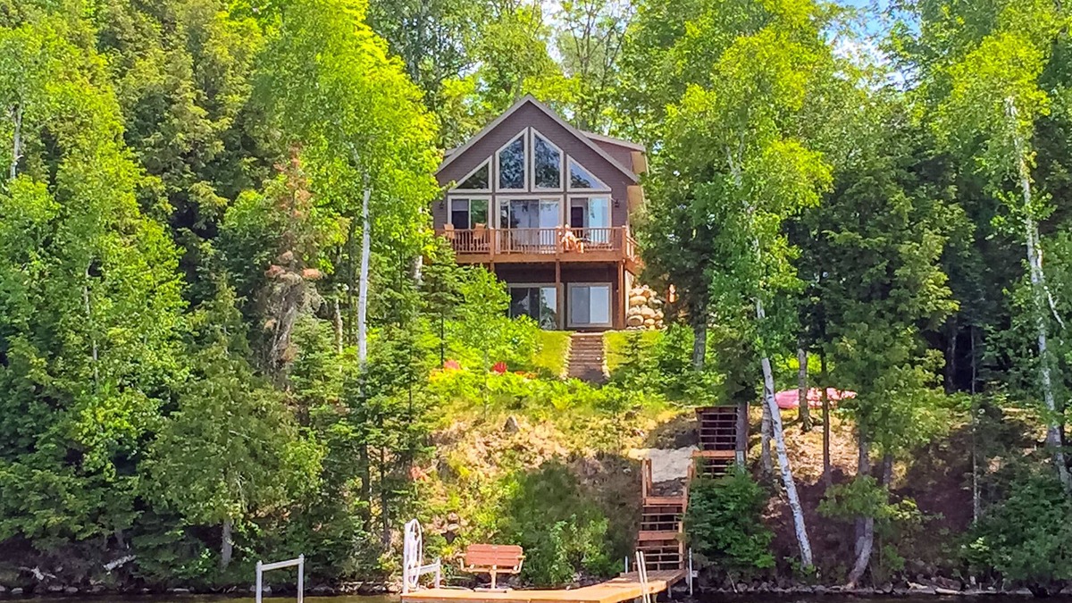 Presque Isle House | Lakefront home w/furnished deck, firepit & private dock - dogs OK