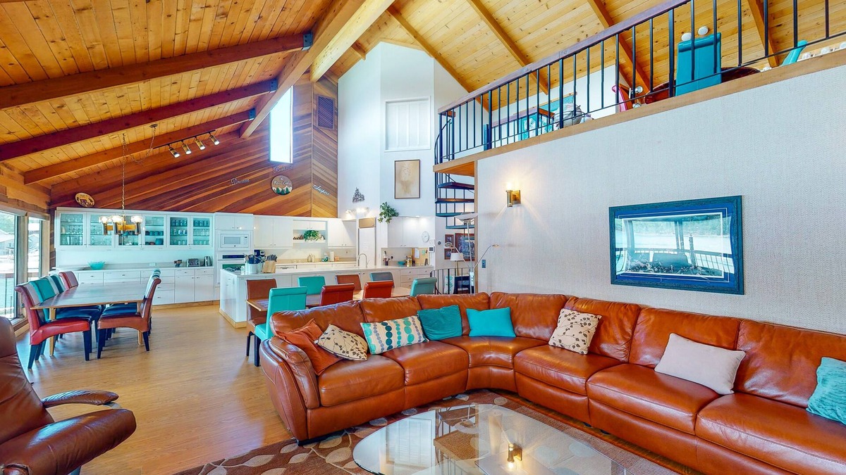 Bass Lake House | Lakefront home w/recreation room, hot tub, central AC, WiFi, private dock, & W/D