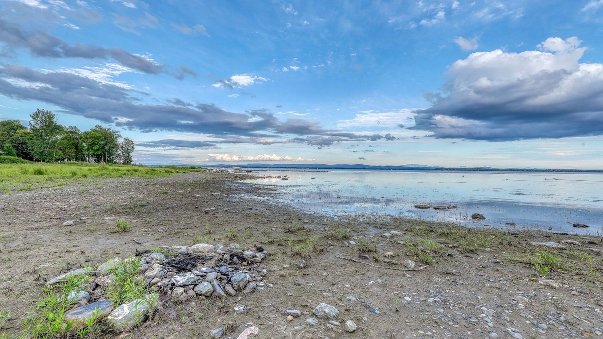 North Hero House | Lakefront home with 17 acres - amazing water views, sauna, inviting deck