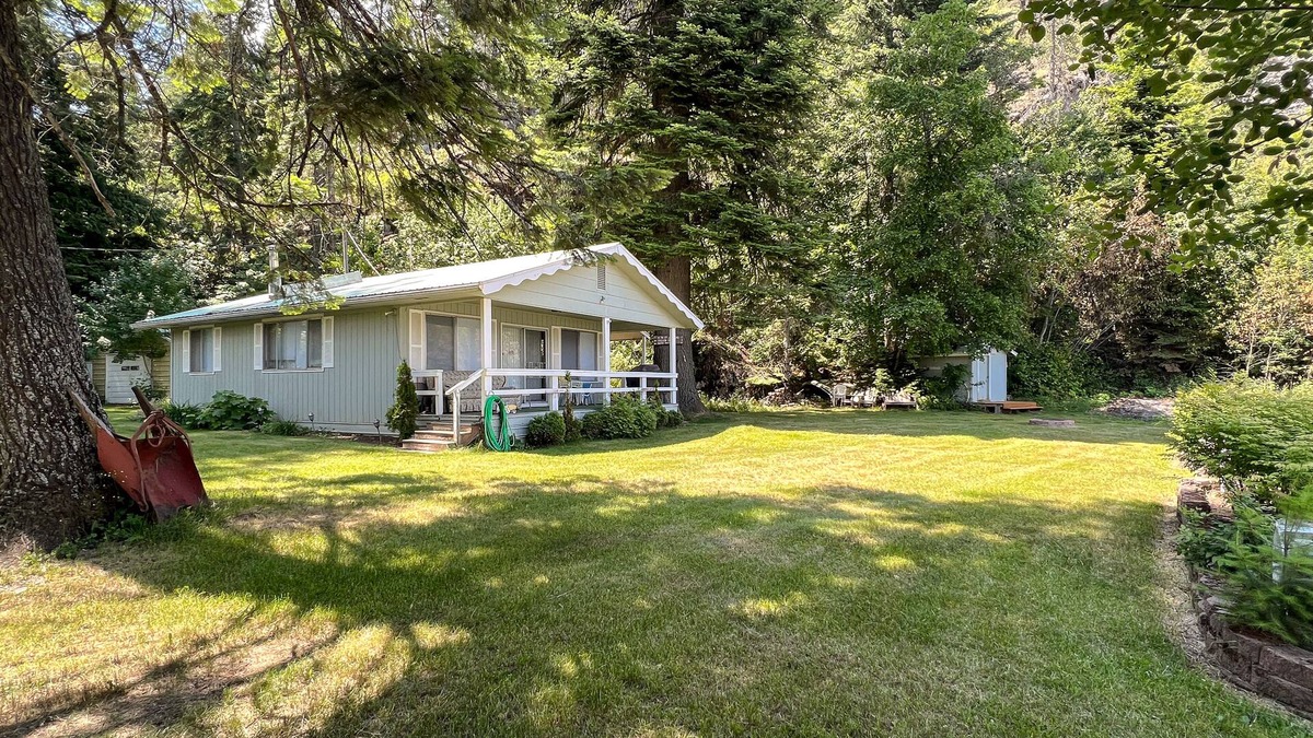Rathdrum House | Lakefront home with private dock, large yard, wood stove, firepit, grill, W/D