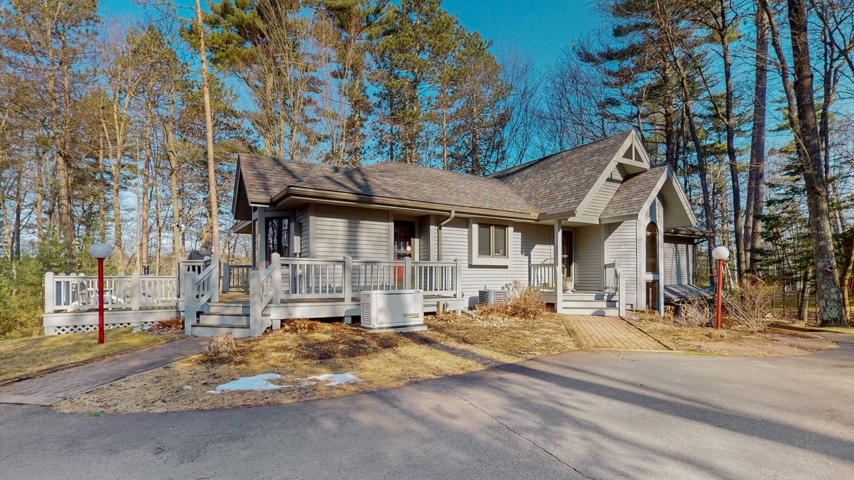 Hazelhurst House | Lakefront home with private outdoor sauna, dock, firepit, wood fireplace & patio