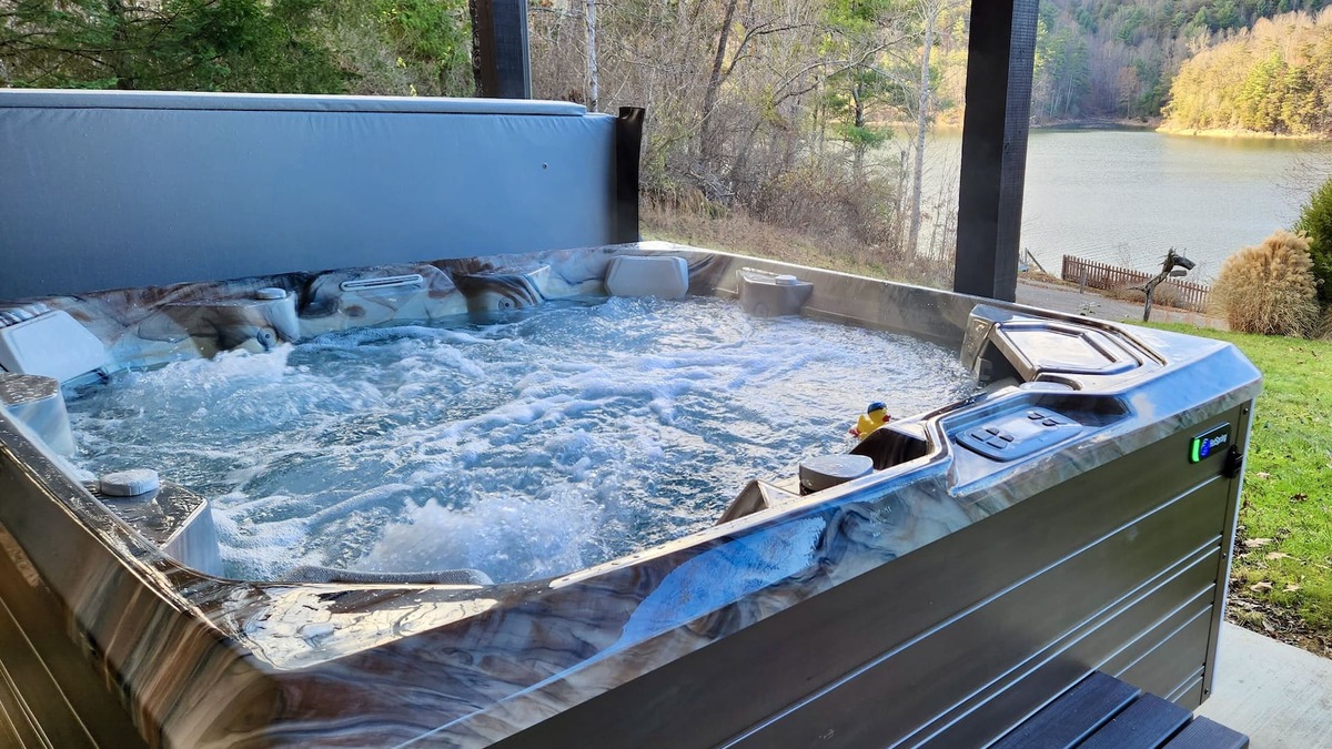 Butler Cabin | Lakefront Lullaby-Rustic cabin w/lake views, boatslip, hot tub & fiber internet