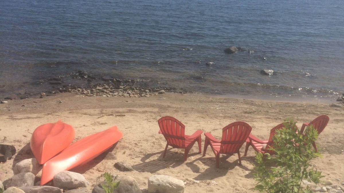 Town of Beekmantown Cottage | Lakefront, private beach, dock, kayaks, Paddle Boat and pet friendly!