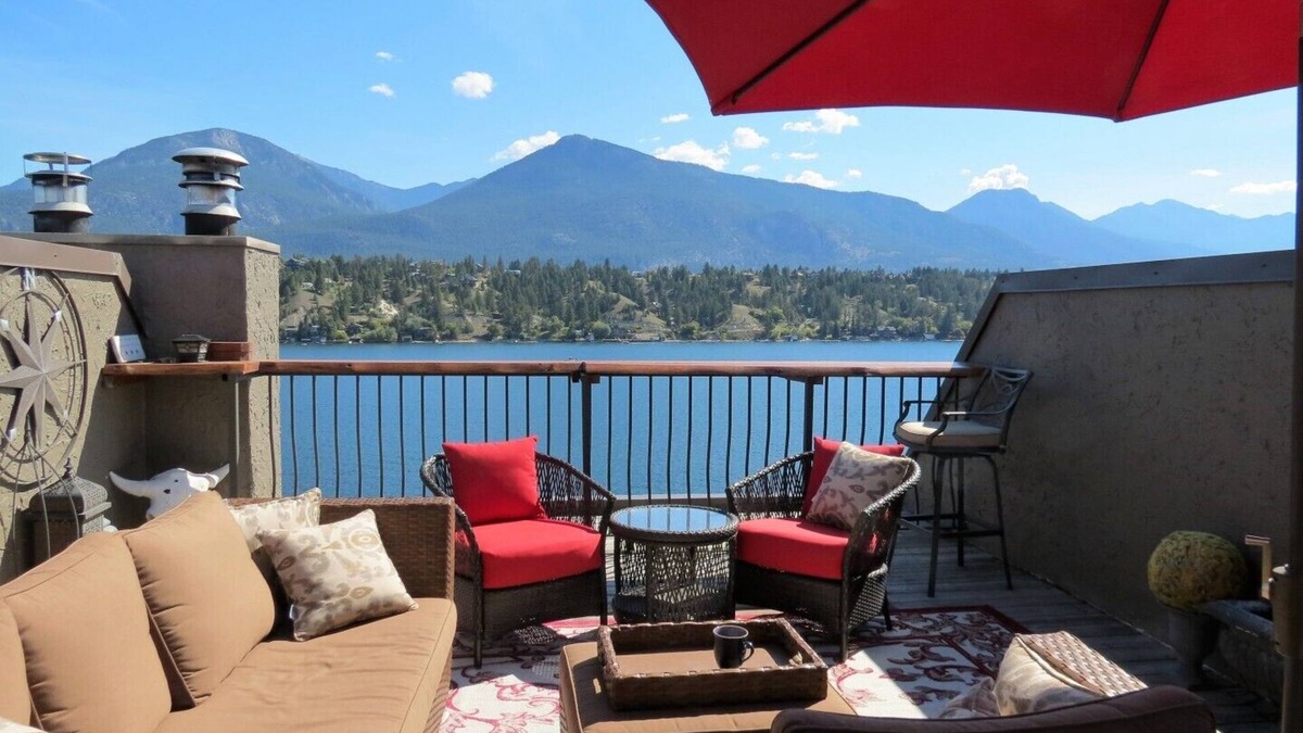 East Kootenay House | Lakefront townhome with outstanding mountain, and lake views and private deck
