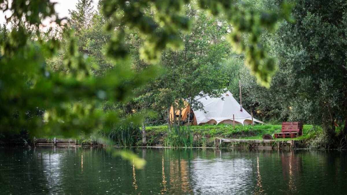 Nunney RV Rental | Lakeside Bell Tent - Canvas Suite at Marston Park