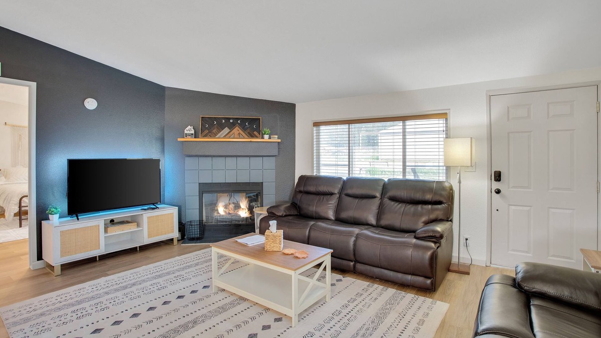 Pine Hollow House | Lakeside King Suite: Luxurious and Cozy with Stunning Golden Hour Views.