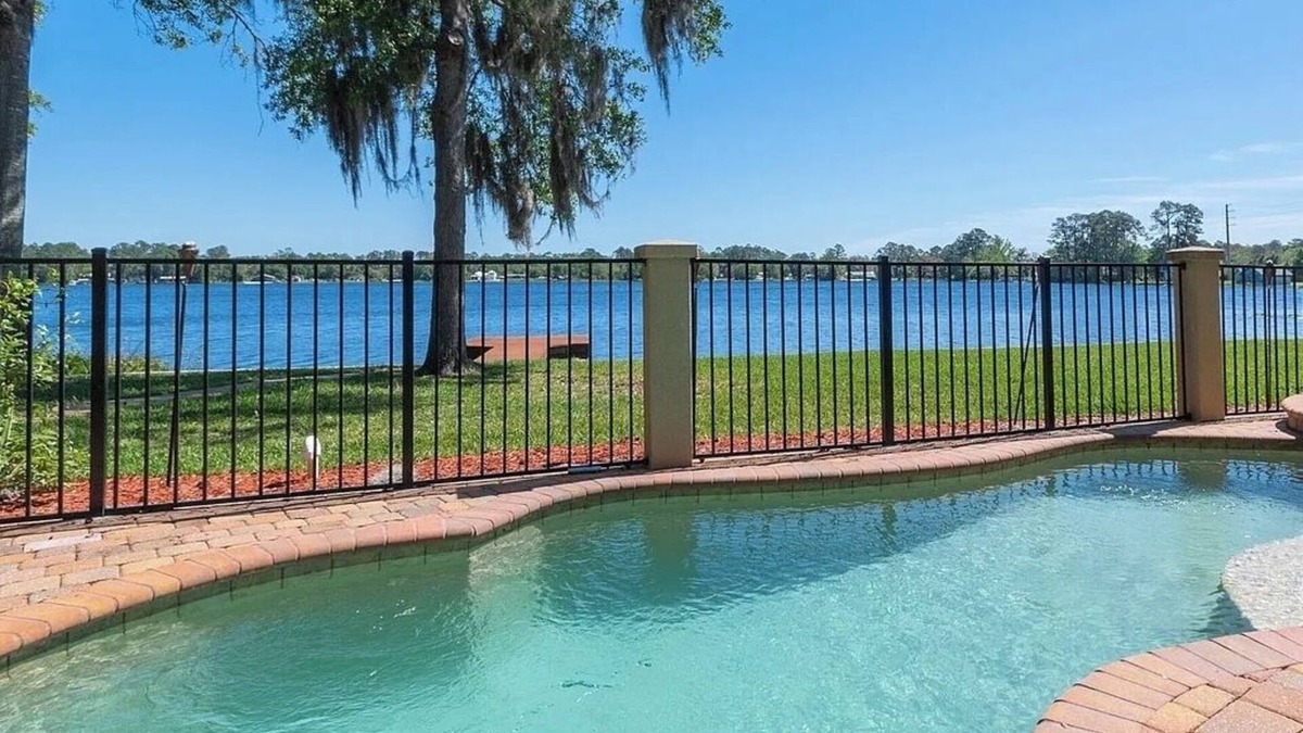 Interlachen House | Lakeside Retreat~ Large home with pool, dock, game room and balcony on lakefront
