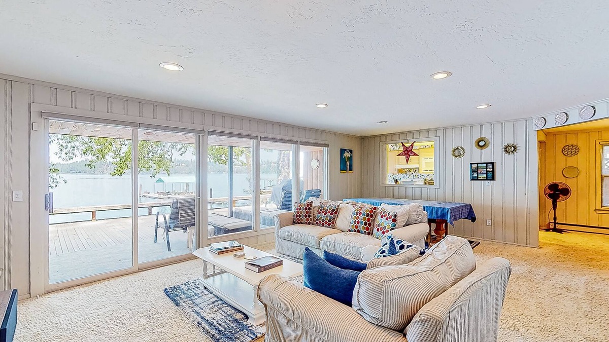 Clarksville House | Lakeside retreat with a dock, firepit, grill, board games, jetted tub, and W/D