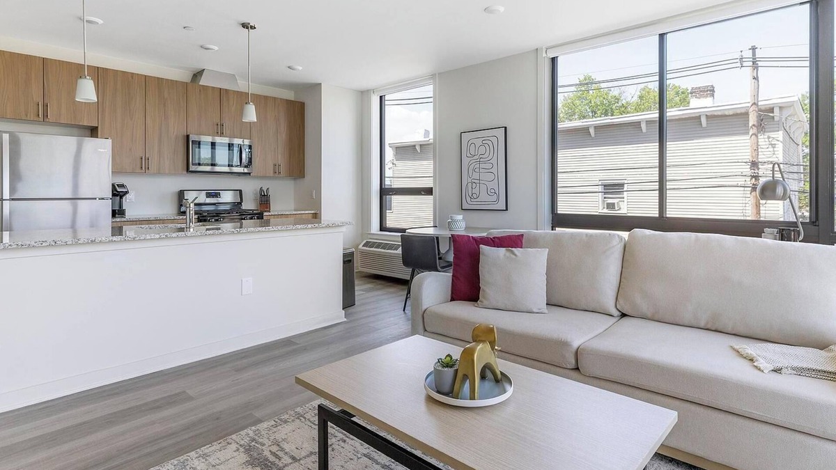 Carteret Apartment | Landing | Modern 2BD, Rooftop Lounge, Gym
