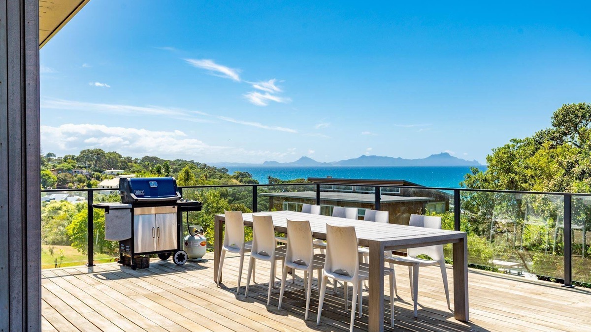 Langs Beach House | Langs Beach House - Modern, sunny holiday home with large decks and stunning views over Bream Bay