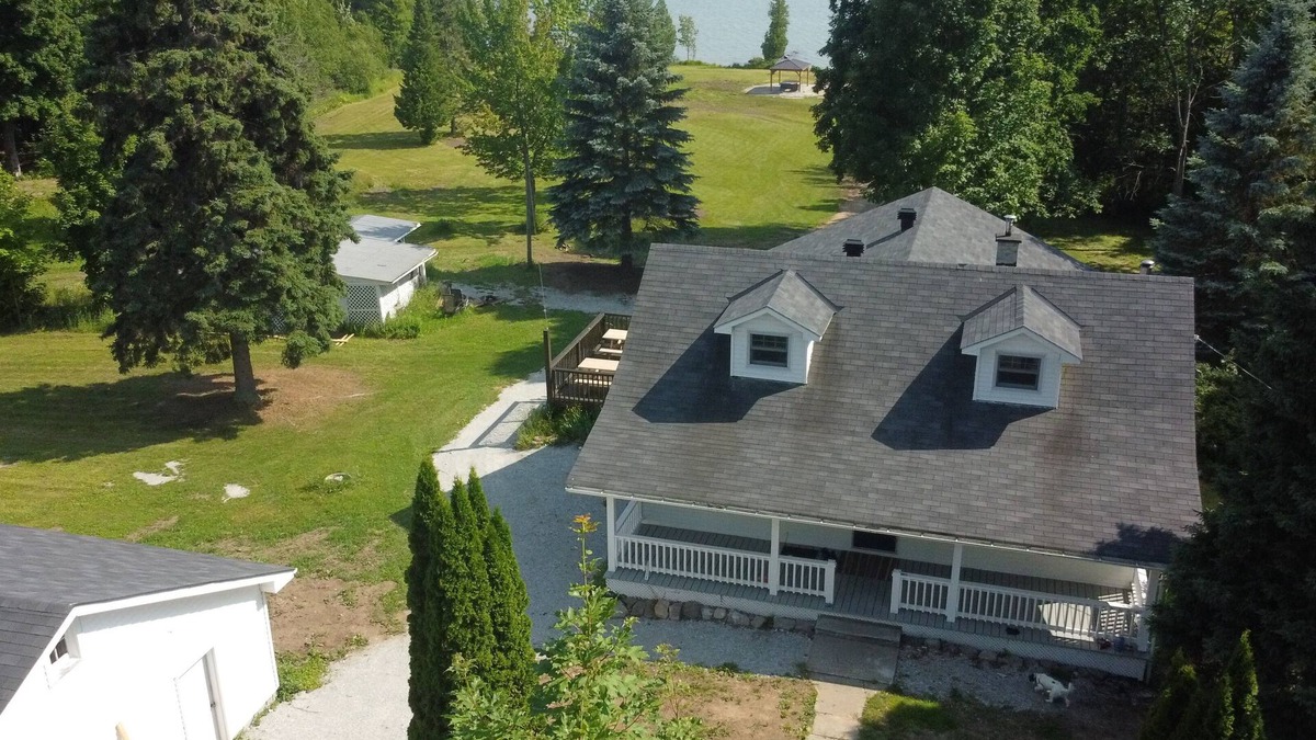 Algoma District Cottage | Large farmhouse style cottage located on three acres of waterfront property.