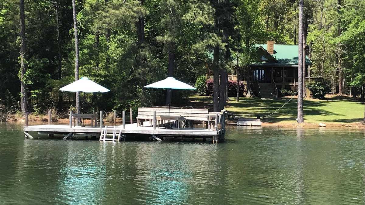 Gilbert House | Large Log Cottage: Green Grass, Blue Skies, Lake Living