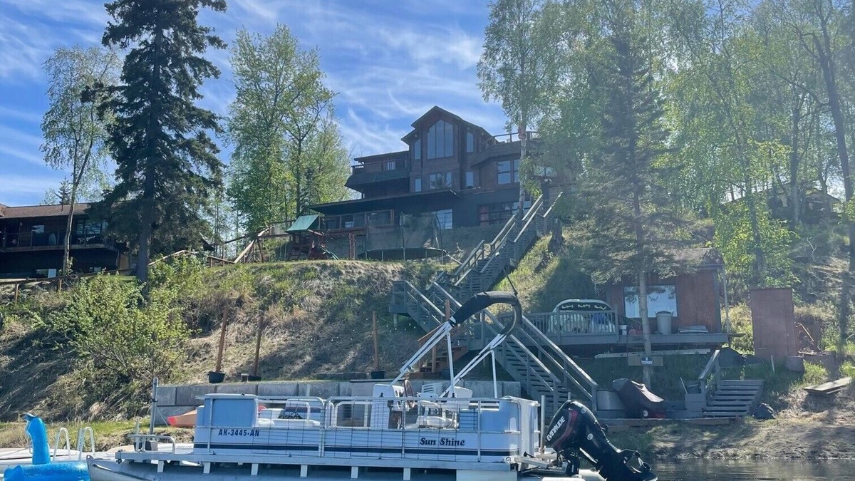 Sand Lake House | Large luxurious lakefront home with water toys & mountain view