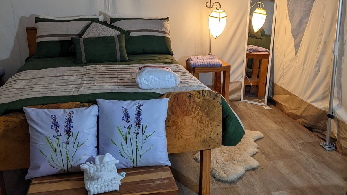 Sequim RV Rental | Lavender Glamping Tent with heater , mini fridge and fire pit.n