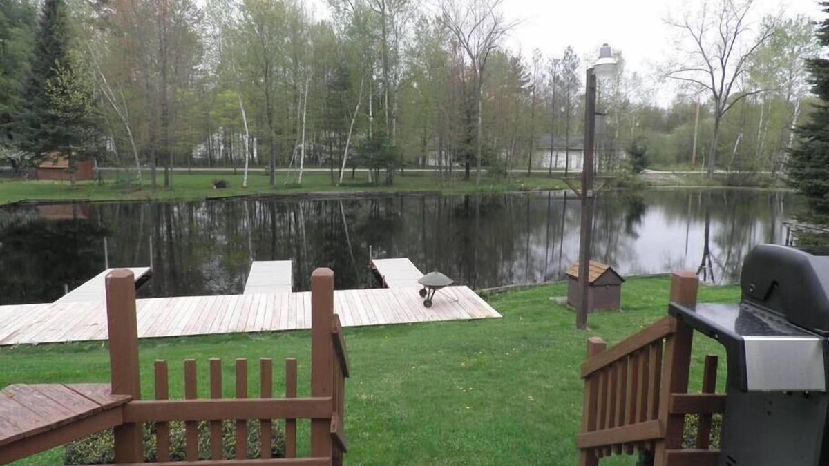 Cadillac House | Lazy Acorn "The Yellow Perch" on Lake Mitchell