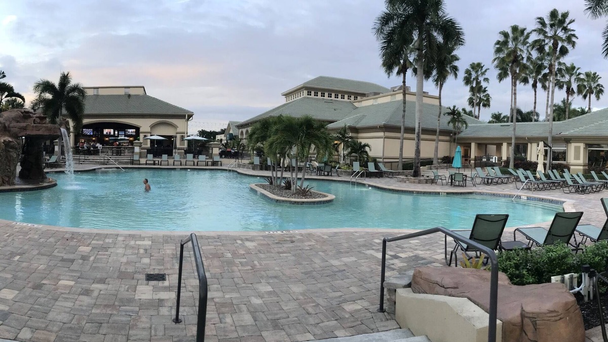 Biggar Condo | Legends Golf & Country Club Ft Myers Florida Resort style pool outdoor dining