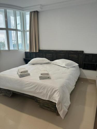 Sfax Apartment | Les portes grisées