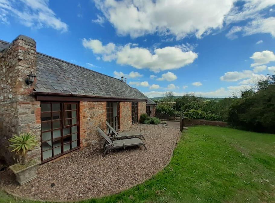 Cornwall House | Light & Airy Vaulted Barn Conversion with a View