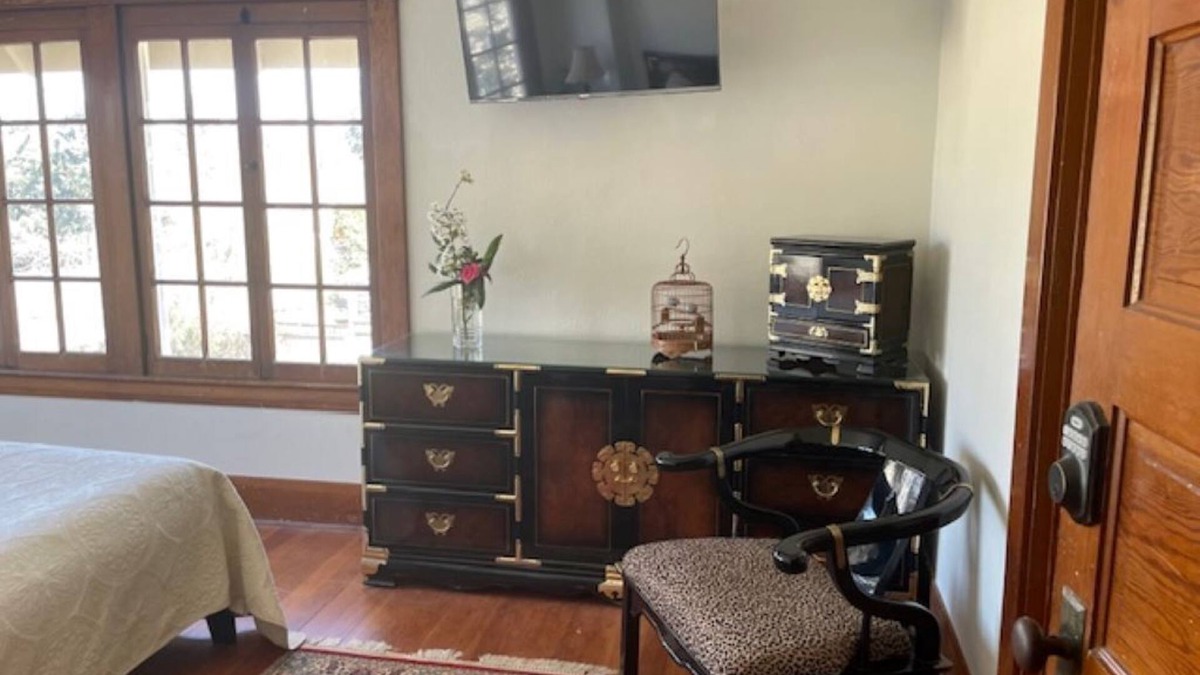 Carnation Bed & Breakfast | Light-filled room with a treetop view in an updated historic Forest Grove home!